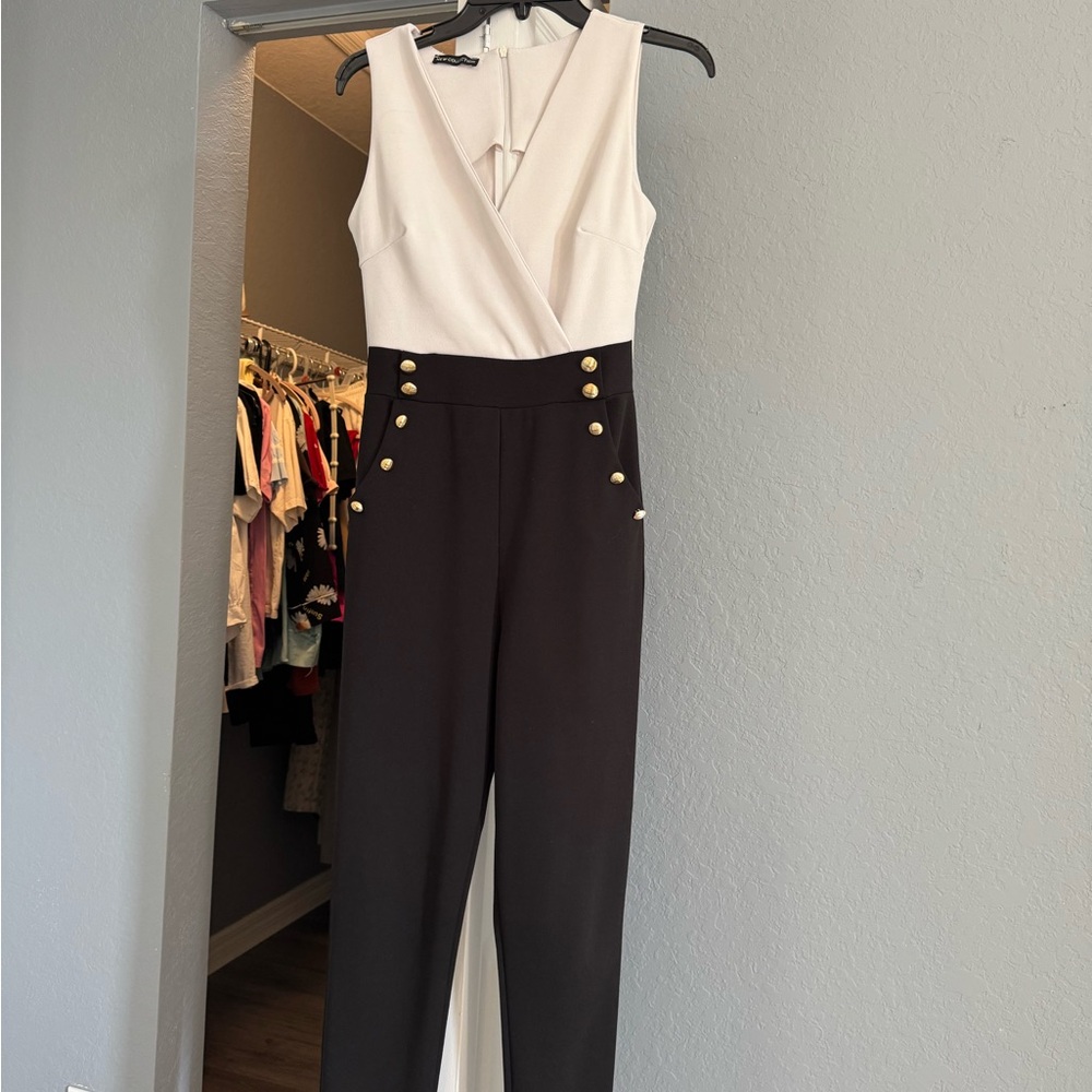 Chic Black and White Jumpsuit with Gold Accents